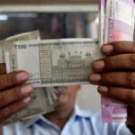 Rupee gains 27 paise to close at 81.84 against U.S. dollar