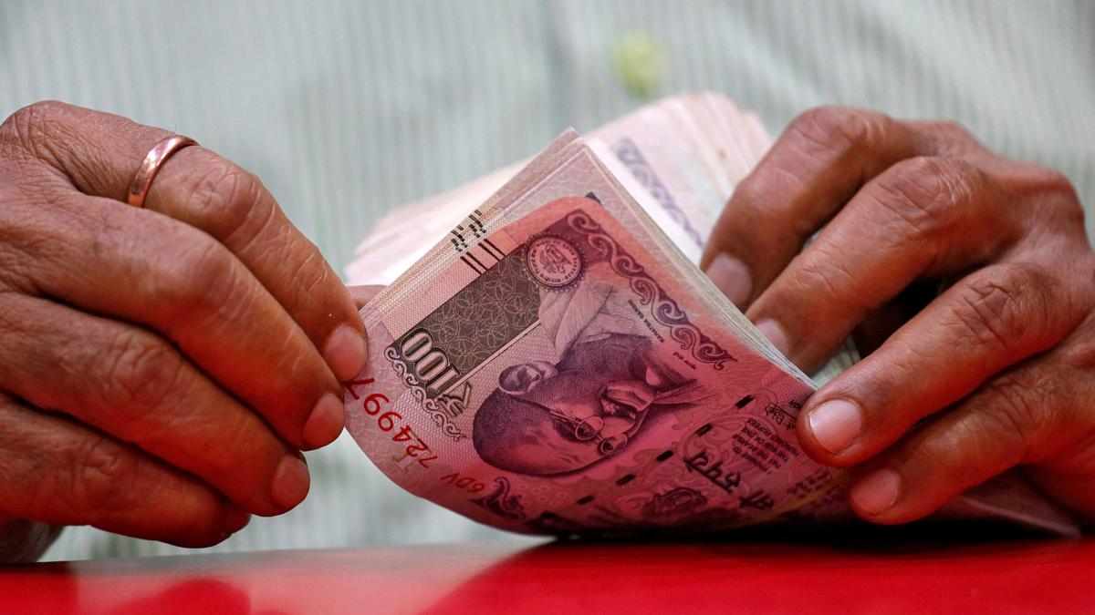 Rupee rises 4 paise to settle at 83.01 against U.S. dollar