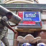 Sensex, Nifty turn flat after firm opening